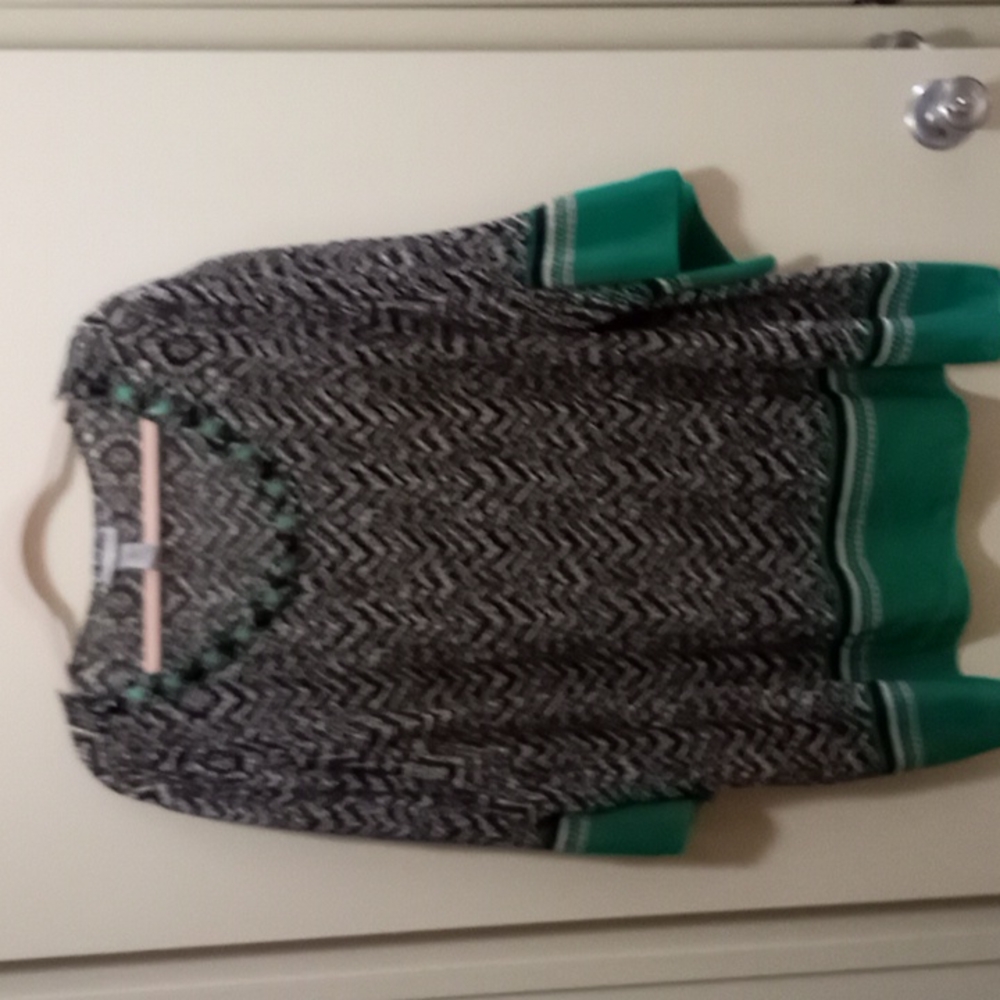 Catherine's green and black shirt